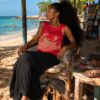 Red imaged top with black skirt