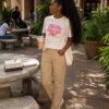Imaged cream top with brown jeans