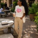 Imaged cream top with brown jeans
