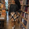long sleeved top with stripped skirt