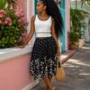 Mini top with flared patternized skirt