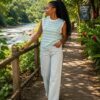 sleeveless top with flared tail jeans