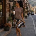 Brown top with plaid skirt