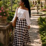 Whit top with flared patternized skirt